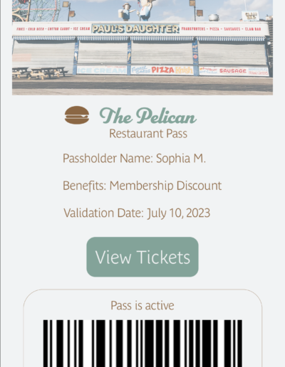 The user has a membership discount to The Pelican, an Ocean Shore restaurant. The "View Ticket" button is clicked displaying the barcode to receive their discount.